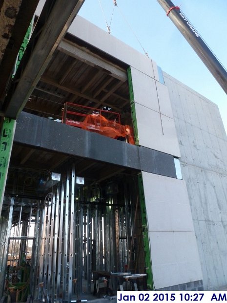 Erecting Stone panels at the 4th floor East Elevation 1